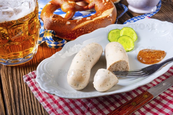 Bavarian veal sausage pretzels and beer at the Oktoberfest