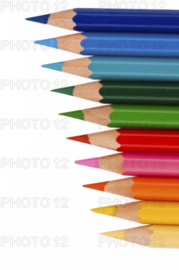 Many different coloured pencils on a white background, Many different colored pencils on white background Austria