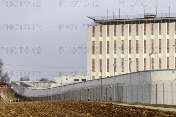 Stammheim prison, JVA. Exterior view with prison wall and barbed wire. Stuttgart, Baden-Württemberg, Germany