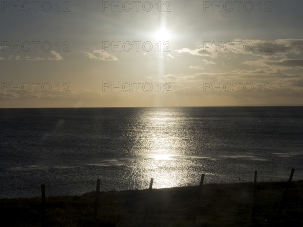 Sunrise over the sea at the Strait of Magellan, Punta Arenas, Chile