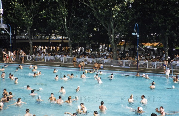 Crowded outdoor swimming pool, Madrid, Spain 1959