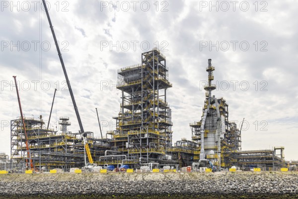 A bio-refinery is being built here. Construction site of the Finnish oil company Neste. Maasvlakte 2 deep-sea harbour on artificial land. Rotterdam, Zuid-Holland, Netherlands