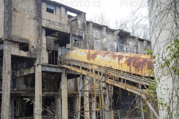 Lynch, Kentucky - Coal mining equipment remains in a former U.S. Steel company town in Harlan County. A conveyor was used to move coal into the power house that supplied electricity for the mines and the town. Automation and the subsequent closure of most mines have reduced the area's population and increased its poverty