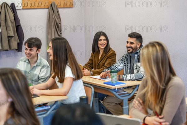 Cheerful university students enjoying their time in the classroom, actively participating and engaging in the learning process