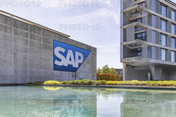 Logo and building of the listed software company SAP, headquarters. Walldorf, Baden-Württemberg, Germany