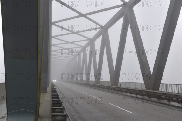 Grünental High Bridge on the Kiel Canal with fog, Schleswig-Holstein, Germany