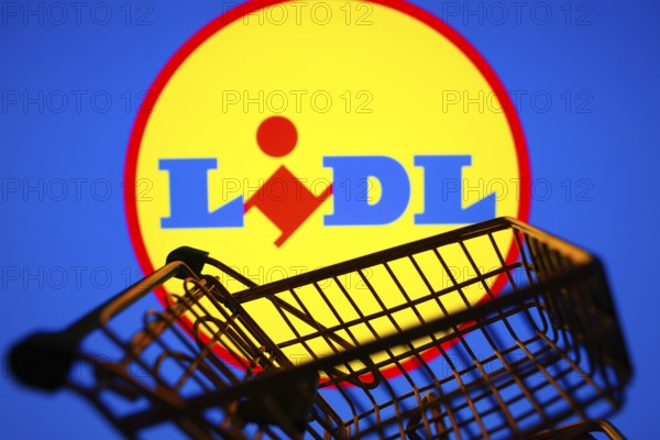 March 31, 2024, Brazil. In this photo illustration, the Lidl logo seen displayed on a smartphone along with a shopping cart
