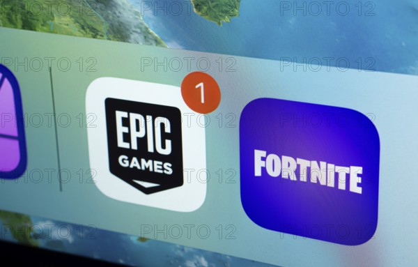 A close up of an iPad screen displaying the Epic Games and Fortnite app