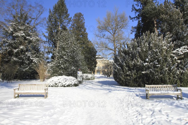 Snow-covered palace garden of Hohenheim Palace, University of Hohenheim, Stuttgart, Baden-Württemberg, Germany