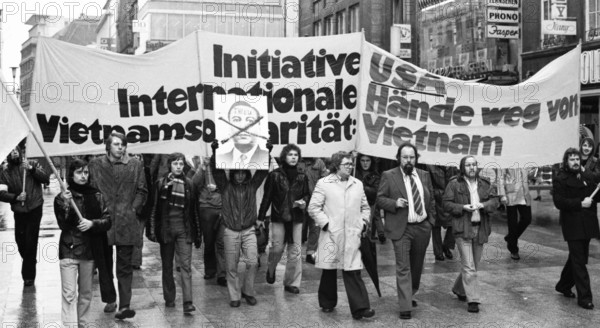 Against the war in Vietnam, supporters of the peace movement demonstrated in Essen, Germany, on 25.01.1975