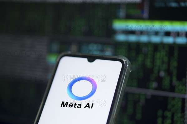Meta AI logo on smartphone for Facebook Artificial Intelligence.