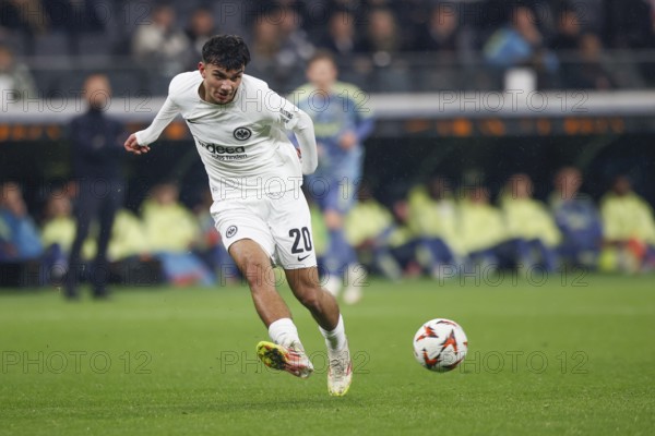 Football, Europa League, round of 16 second leg, 2024/2025, Eintracht Frankfurt vs. Ajax Amsterdam, 13.03.2025, Frankfurt Stadion, Frankfurt, Germany, Can UZUN (Eintracht Frankfurt, 20) on the ball