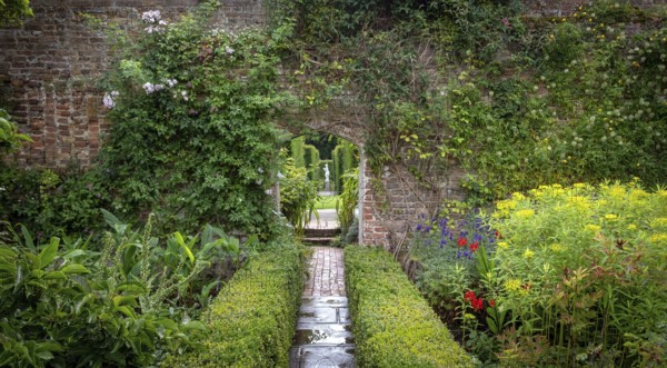 Beautiful flowers, trees and plants and garden landscaping in Sissinghurst Caslte Gardens in Cranwood, England, United Kingdom