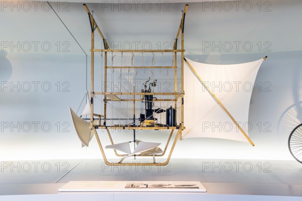 Wölfert's motorised airship from 1888. The Mercedes-Benz Museum in Stuttgart presents a journey through the automotive history of the global corporation. The history of the Mercedes star begins with the first automobile in 1886. 160 vehicles are on display. Stuttgart, Baden-Württemberg, Germany
