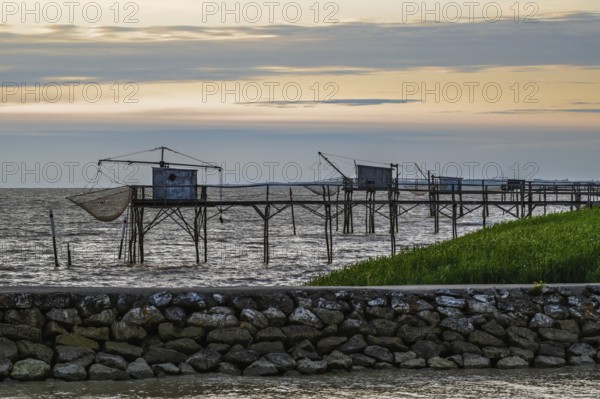 Sunset over Fishing huts over Randonnee entre Histoire et Nature, Fouras, Fouras-les-Bains, Charente-Maritime, Nouvelle-Aquitaine, France