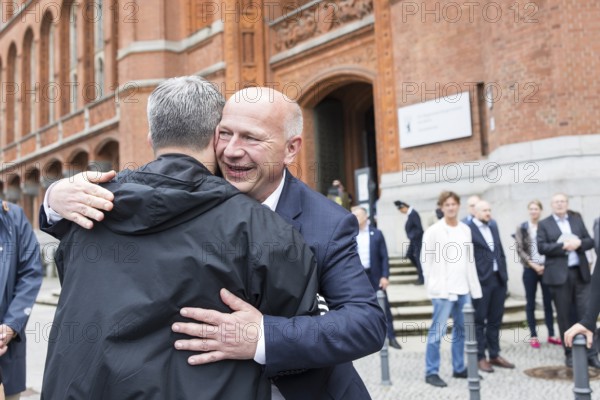 Kai Wegner (Governing Mayor of Berlin) welcoming members of the LSVD (Lesbian and Gay Federation in Germany) in front of the raising of the rainbow flag for Pride Week in front of the Rotes Rathaus in Berlin on 9 July 2025