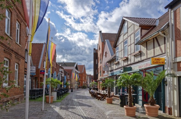 Buildings and shops in Lange Straße in the historic old town centre of Nienburg an der Weser. Nienburg, Lower Saxony, Germany