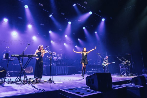 Sharon Corr (violinist and accompanying vocals), Andrea Corr (singer) and Jim Corr (guitarist) from The Corrs live at the Tollwood Festival in Munich on 26 June 2025