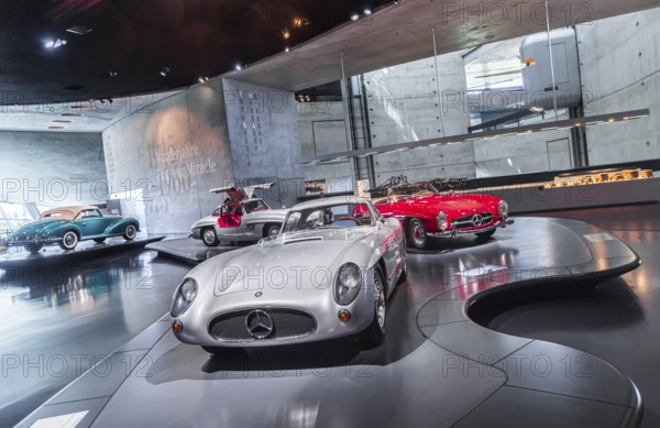 Mercedes-Benz 300 SLR Uhlenhaut Coupé from 1955. Two examples were built, one was auctioned. With proceeds of 135 million euros, it is the most valuable car in the world. The Mercedes-Benz Museum in Stuttgart presents a journey through the automotive history of the global corporation. The history of the Mercedes star begins with the first automobile in 1886. 160 vehicles are on display. Stuttgart, Baden-Württemberg, Germany