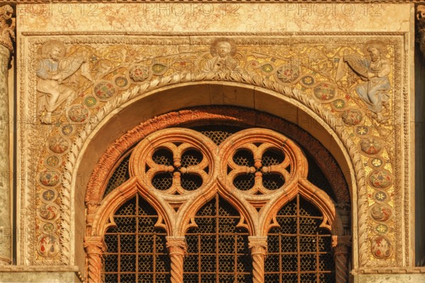 West portal of the Basilica di San Marco, Roman Catholic Basilica of St Mark on St Mark's Square, Venice, Veneto, Italy