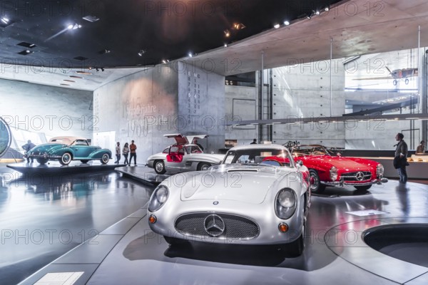 Mercedes-Benz 300 SLR Uhlenhaut Coupé from 1955. Two examples were built, one was auctioned. With proceeds of 135 million euros, it is the most valuable car in the world. The Mercedes-Benz Museum in Stuttgart presents a journey through the automotive history of the global corporation. The history of the Mercedes star begins with the first automobile in 1886. 160 vehicles are on display. Stuttgart, Baden-Württemberg, Germany
