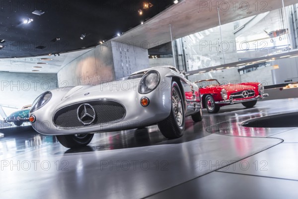Mercedes-Benz 300 SLR Uhlenhaut Coupé from 1955. Two examples were built, one was auctioned. With proceeds of 135 million euros, it is the most valuable car in the world. The Mercedes-Benz Museum in Stuttgart presents a journey through the automotive history of the global corporation. The history of the Mercedes star begins with the first automobile in 1886. 160 vehicles are on display. Stuttgart, Baden-Württemberg, Germany