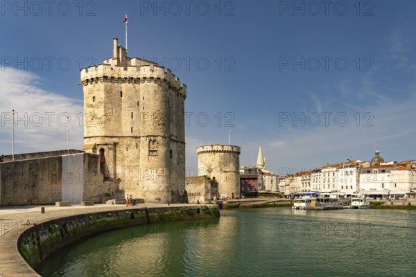 Harbour entrance to the old Vieux Port with the medieval towers Tour St.-Nicolas, Tour de la Lanterne and Tour de la Chaine, La Rochelle, France
