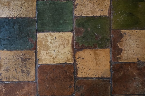 Floor made from old coloured tiles, Netherlands