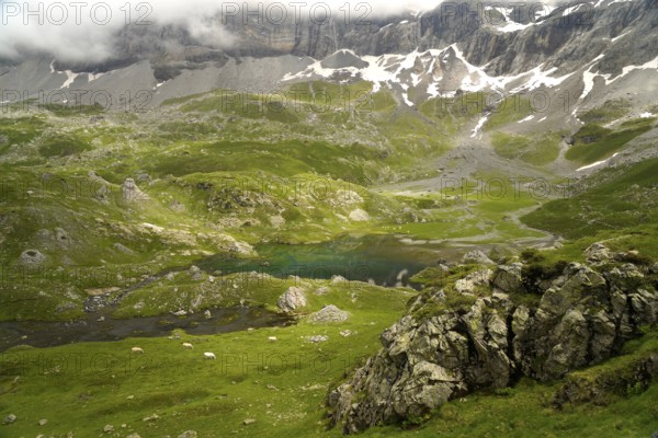 The Lacs des Aires lake in the Cirque de Troumouse basin in the Pyrenees National Park near Gavarnie-Gèdre, France