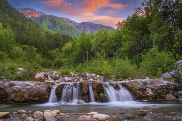 View of a waterfall of the Rio Plima stream in the evening light, long exposure, landscape photo, nature photo, landscape format, forest, trees, Dolomites, South Tyrol, mountains, Laces, Morter, Italy