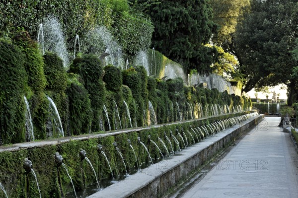 Avenue of a Hundred Fountains, Viale delle Cento Fontane, behind Fontana della Rometta, Renaissance garden of Villa d'Este, water features, fountains, UNESCO World Heritage Site, Tivoli, Metropolitan City of Rome, Lazio, Italy