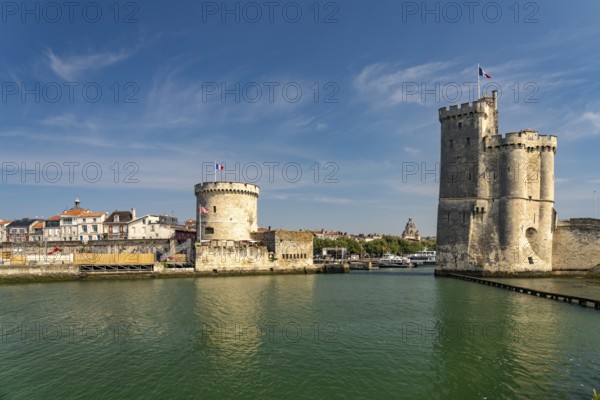 Harbour entrance to the old Vieux Port with the medieval towers Tour St.-Nicolas and Tour de la Chaine, La Rochelle, France