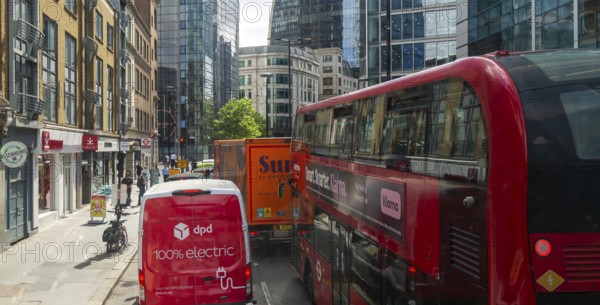 View from double decker bus window of traffic congestion, Wormwood Street, City of London, London, England, UK