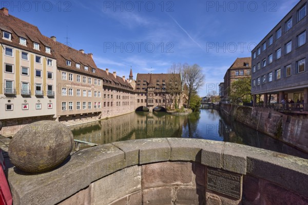 Heilig-Geist-Spital, Spital-Apotheke, river Pegnitz, museum bridge, facades, windows, sandstone wall, historic hospital, pharmacy, signpost to the building, general architecture, trees, reflections, water surface, blue sky, cirrostratus clouds, Nuremberg, Middle Franconia, independent city, Bavaria, Germany
