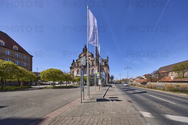 Flags, flagpoles, Nuremberg State Theatre, theatre, trees, general architecture, bus stop, pavement, concrete paving stones, blue sky, cirrostratus clouds, Frauentorgraben, Nuremberg, Middle Franconia, independent city, Bavaria, Germany