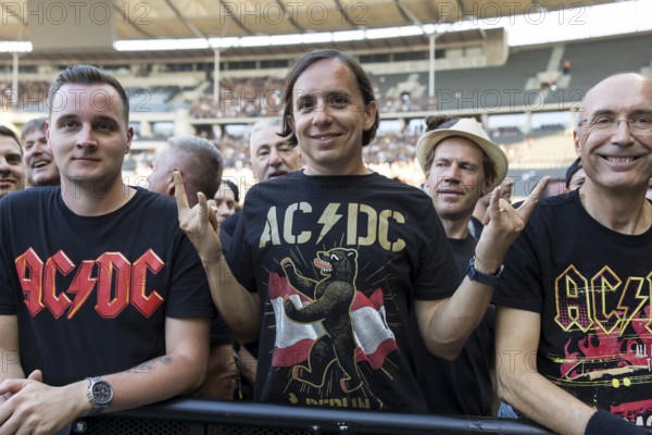 Fan in the front row with AC/DC Berlin shirt in front of the concert of AC/DC live on Power Up Tour 2025 at the Olympiastadion Berlin on 30.06.2025