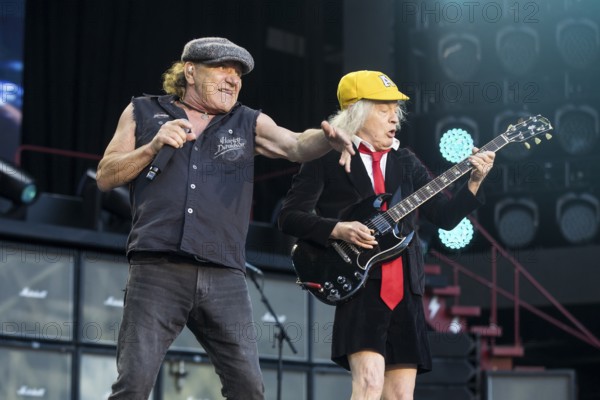 Brian Johnson (singer) and Angus Young (lead guitarist) from AC/DC live on Power Up Tour 2025 at the Olympiastadion Berlin on 30 June 2025