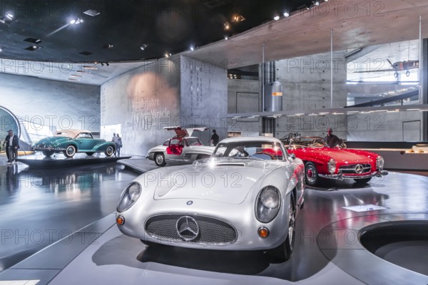 Mercedes-Benz 300 SLR Uhlenhaut Coupé from 1955. Two examples were built, one was auctioned. With proceeds of 135 million euros, it is the most valuable car in the world. The Mercedes-Benz Museum in Stuttgart presents a journey through the automotive history of the global corporation. The history of the Mercedes star begins with the first automobile in 1886. 160 vehicles are on display. Stuttgart, Baden-Württemberg, Germany