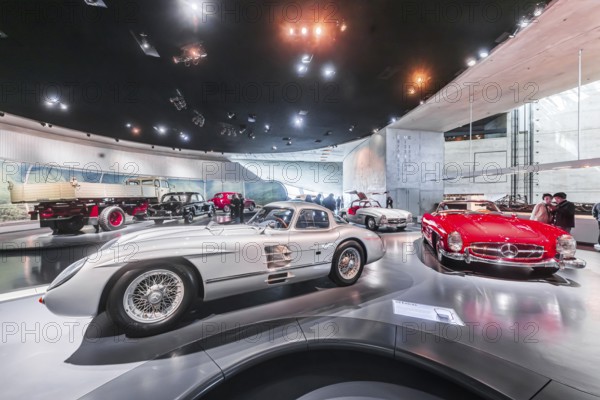 Mercedes-Benz 300 SLR Uhlenhaut Coupé from 1955. Two examples were built, one was auctioned. With proceeds of 135 million euros, it is the most valuable car in the world. The Mercedes-Benz Museum in Stuttgart presents a journey through the automotive history of the global corporation. The history of the Mercedes star begins with the first automobile in 1886. 160 vehicles are on display. Stuttgart, Baden-Württemberg, Germany