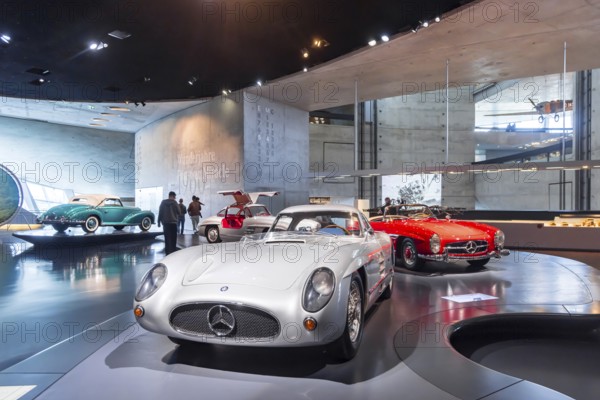 Mercedes-Benz 300 SLR Uhlenhaut Coupé from 1955. Two examples were built, one was auctioned. With proceeds of 135 million euros, it is the most valuable car in the world. The Mercedes-Benz Museum in Stuttgart presents a journey through the automotive history of the global corporation. The history of the Mercedes star begins with the first automobile in 1886. 160 vehicles are on display. Stuttgart, Baden-Württemberg, Germany