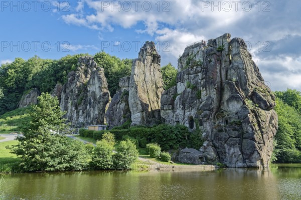 The Externsteine, a sandstone rock formation around 40 metres high in the Teutoburg Forest, are a natural landmark and a protected natural and cultural monument. They are regarded as a place of power and are said to have special cultural and historical significance. The rocks are located by the Wiembecketeich pond. Horn-Meinberg, North Rhine-Westphalia, Germany