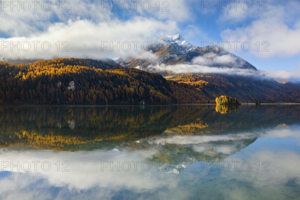 Fog over Lake Sils with Piz da la Margna in the background, Upper Engadine, Canton Graubünden, Switzerland