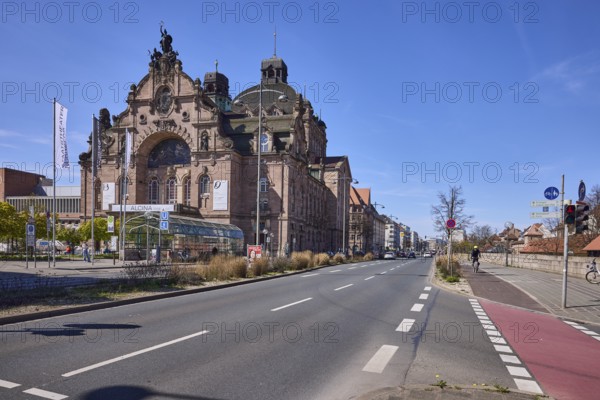 Nuremberg State Theatre, architect Christian Heinrich Seeling, flags, flagpoles, opera and theatre, blue sky, cirrostratus clouds, crossing Frauentorgraben with Grasersgasse, Nuremberg, Middle Franconia, independent city, Bavaria, Germany