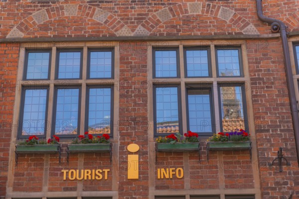 Tourist information in the Haus des Glockenspiels, Böttcherstrasse, cultural monument in the historic city centre, red brick building, sight, attraction, pedestrian zone, Hanseatic city of Bremen, Germany