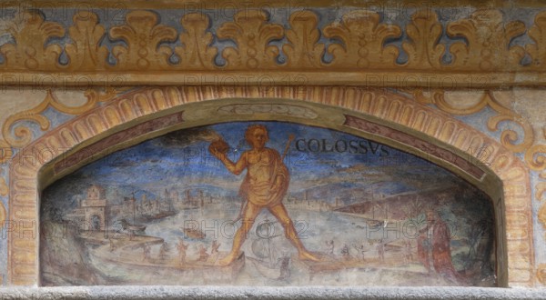 Fresco of the Wonder of the World Colossus of Rhodes at the Fountain of Wonders, 1508, in the courtyard of Neustift St Margarethen Monastery, Vahrn, district of Bolzano, South Tyrol, Italy