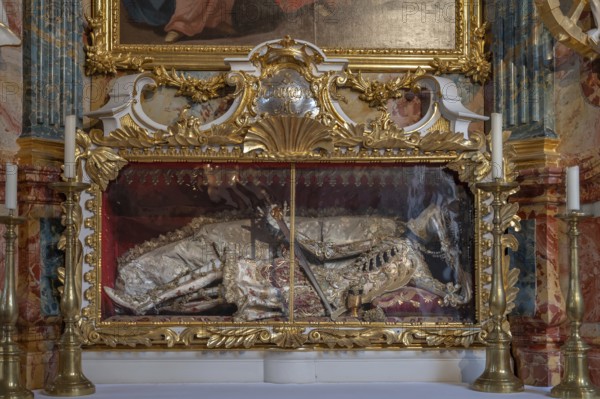 Catracomb Saint Clemens, laid in a glass coffin, Baroque parish church of St Nicholas, 1725, Tannheim, Austria