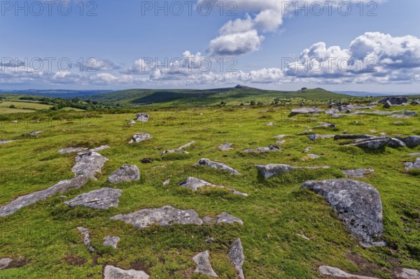 Stones and landscape at the top Tor tor rock hill in Dartmoor National Park. Widecombe-in-the-Moor, Bovey Tracey, Devon, South England, Great Britain