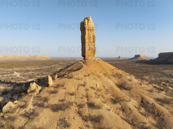 The Vingerklip (rock finger) and the Ugab Valley Terraces are surrounded by thornbush and mopane (Colophospermum mopane) savanna. Aerial view. Drone shot. Damaraland, Namibia