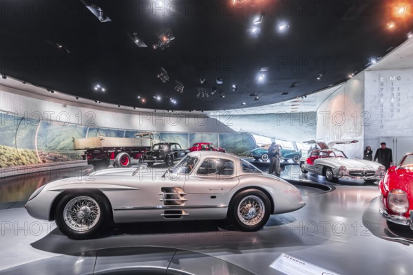 Mercedes-Benz 300 SLR Uhlenhaut Coupé from 1955. Two examples were built, one was auctioned. With proceeds of 135 million euros, it is the most valuable car in the world. The Mercedes-Benz Museum in Stuttgart presents a journey through the automotive history of the global corporation. The history of the Mercedes star begins with the first automobile in 1886. 160 vehicles are on display. Stuttgart, Baden-Württemberg, Germany