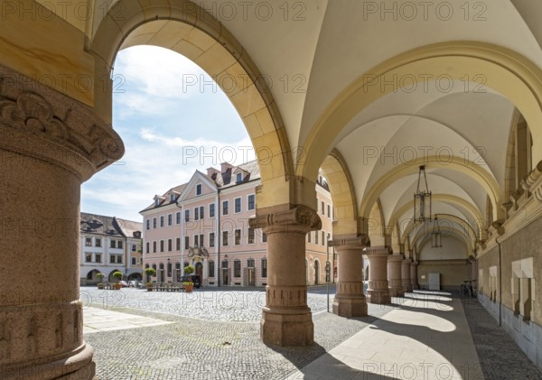 View of Hotel Börse through the arches of the New Town Hall of Görlitz, Lower Market Square - Untermarkt, Goerlitz, Germany